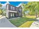 Charming two-story home with a well-manicured lawn, providing a welcoming and picturesque curb appeal at 3480 Fairway Ln, Orlando, FL 32804
