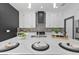 Beautiful kitchen with white cabinetry, quartz countertops, and stylish backsplash, creating a gourmet experience at 3480 Fairway Ln, Orlando, FL 32804