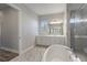 Spa-like bathroom with soaking tub and separate shower at 16829 Bolsena Dr, Montverde, FL 34756