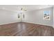 Spacious bedroom with wood floors and ceiling fan at 16829 Bolsena Dr, Montverde, FL 34756