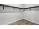 Walk-in closet with custom shelving at 16829 Bolsena Dr, Montverde, FL 34756