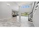 Open concept dining room with view to kitchen and backyard at 16829 Bolsena Dr, Montverde, FL 34756