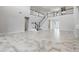Open concept dining room with view to kitchen and backyard at 16829 Bolsena Dr, Montverde, FL 34756