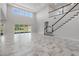 Open concept dining room with view to kitchen and backyard at 16829 Bolsena Dr, Montverde, FL 34756