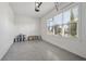 Bright garage with large window and epoxy floor at 16829 Bolsena Dr, Montverde, FL 34756