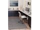 Bright home office with built-in desk and ample storage at 16829 Bolsena Dr, Montverde, FL 34756