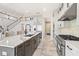 Spacious kitchen island, stainless steel appliances, and two-story view at 16829 Bolsena Dr, Montverde, FL 34756