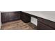 Home office with dark cabinetry and white countertops at 16829 Bolsena Dr, Montverde, FL 34756