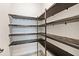 Spacious pantry with ample shelving for storage at 16829 Bolsena Dr, Montverde, FL 34756