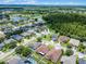 Large neighborhood with many homes and lake at 17843 Golden Leaf Ln, Orlando, FL 32820