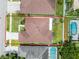 Aerial view of the property, surrounded by lush greenery, with a defined lot outline and nearby amenities at 17843 Golden Leaf Ln, Orlando, FL 32820
