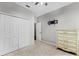 Bedroom featuring neutral walls, carpet flooring, closet, and chest of drawers at 17843 Golden Leaf Ln, Orlando, FL 32820