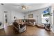 Relaxing living room featuring a sectional sofa, tile floors, and recessed lighting at 17843 Golden Leaf Ln, Orlando, FL 32820