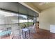 Enjoy this screened patio with brick flooring, outdoor seating, and backyard views at 17843 Golden Leaf Ln, Orlando, FL 32820