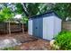 Backyard with shed and wooden swing at 809 Florida Pkwy, Kissimmee, FL 34743