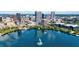 Aerial view of the building near a lake and city skyline at 150 E Robinson St # 1709, Orlando, FL 32801