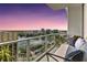 Private balcony with city views and comfortable seating at 150 E Robinson St # 1709, Orlando, FL 32801