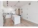 Open concept kitchen with island and stainless steel appliances at 150 E Robinson St # 1709, Orlando, FL 32801