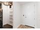 Convenient laundry area with washer, dryer, and storage shelves at 150 E Robinson St # 1709, Orlando, FL 32801