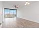 Living room with hardwood floors and stunning city views at 150 E Robinson St # 1709, Orlando, FL 32801