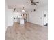 Open living room with hardwood floors and access to kitchen at 150 E Robinson St # 1709, Orlando, FL 32801