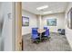 Modern meeting room with a large table and chairs at 150 E Robinson St # 1709, Orlando, FL 32801