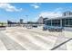 Outdoor patio with seating, grills, and city views at 150 E Robinson St # 1709, Orlando, FL 32801