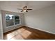 Light and bright bedroom with hardwood floors and large window at 340 Troon Cir, Davenport, FL 33897