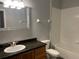 Clean bathroom with granite countertop, single sink, and bathtub at 6100 Stevenson Dr # 207, Orlando, FL 32835