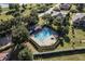 A clear overhead view of the community pool and spa at 2855 Gopherwood Way, Clermont, FL 34711