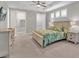 Bright bedroom with a king-size bed and ample closet space at 880 Driving Range Ct, Reunion, FL 34747