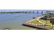 Scenic waterfront view featuring a dock, bridge, and calm waters, perfect for serene living at 101 N Riverside Dr # 4100, New Smyrna Beach, FL 32168