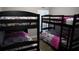 Bedroom with two sets of bunk beds, ideal for or guests at 124 Lancaster Dr, Davenport, FL 33897