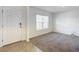 Bright entryway with tile flooring and a view into the living room at 5043 Sw 88Th Pl, Ocala, FL 34476