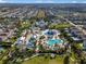 Aerial view of community resort-style pool and water park at 748 Desert Mountain Ct, Reunion, FL 34747