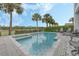 Inviting private pool with a spa and lounge chairs at 748 Desert Mountain Ct, Reunion, FL 34747