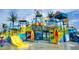 Beach-themed water play area with slides at 748 Desert Mountain Ct, Reunion, FL 34747