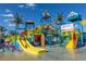 Beach-themed water play area with slides at 748 Desert Mountain Ct, Reunion, FL 34747