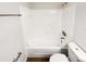 A full bathroom features tiled walls, tub and shower, and tile flooring at 4367 Thornbriar Ln # 108, Orlando, FL 32822