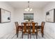 Dining room featuring a wooden table and statement art at 122 Blue Cypress Drive, Davenport, FL 33837