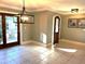 Bright dining room with wood floors and access to the back patio at 9227 Cypress Cove Dr, Orlando, FL 32819