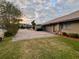 Private driveway with brick pavers and ample parking space at 9227 Cypress Cove Dr, Orlando, FL 32819