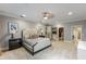 Luxurious main bedroom with ensuite bathroom and walk-in closet at 9227 Cypress Cove Dr, Orlando, FL 32819