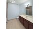 Bathroom features a shower, toilet and large countertop at 3176 Feltrim Pl # 305, Kissimmee, FL 34747