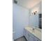 Bathroom features a large mirror, and vanity at 3176 Feltrim Pl # 305, Kissimmee, FL 34747