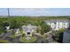 A beautiful community featuring a clubhouse, pool, and lush landscaping at 3176 Feltrim Pl # 305, Kissimmee, FL 34747