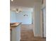 View of an airy living room with light wood floors at 3176 Feltrim Pl # 305, Kissimmee, FL 34747