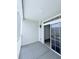 Relax on this quiet patio with sliding glass doors at 3176 Feltrim Pl # 305, Kissimmee, FL 34747