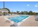 A community pool with lounge chairs for residents at 3176 Feltrim Pl # 305, Kissimmee, FL 34747