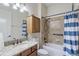 Clean bathroom with shower/tub combo and granite countertop at 32619 View Haven Ln, Sorrento, FL 32776